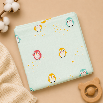 Cozy Penguins Muslin Swaddle